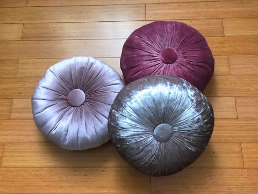 Round stylish plush pillows