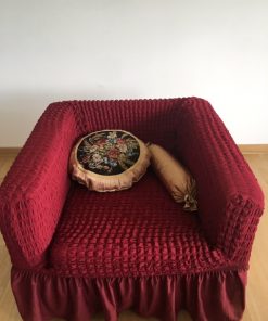 Decorative pillow made of elastic burgundy material